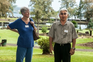Della Allison Yamashiro of Friends of Lili`uokalani Gardens, listens to Hiroshi Suga, president of the Japanese Community Association of Hawaii, speak of cooperation to promote and preserve Japanese culture and foster harmony and fellowship in Hawaii County.