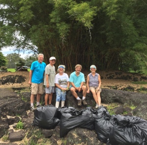 Board members were joined by Queen Lili`uokalani Children's Trust Hilo Children's Center director Lance Niimi and East Hawaii Master Gardener Daghild Rick, among others, for a test clearing of the bamboo thicket in June.